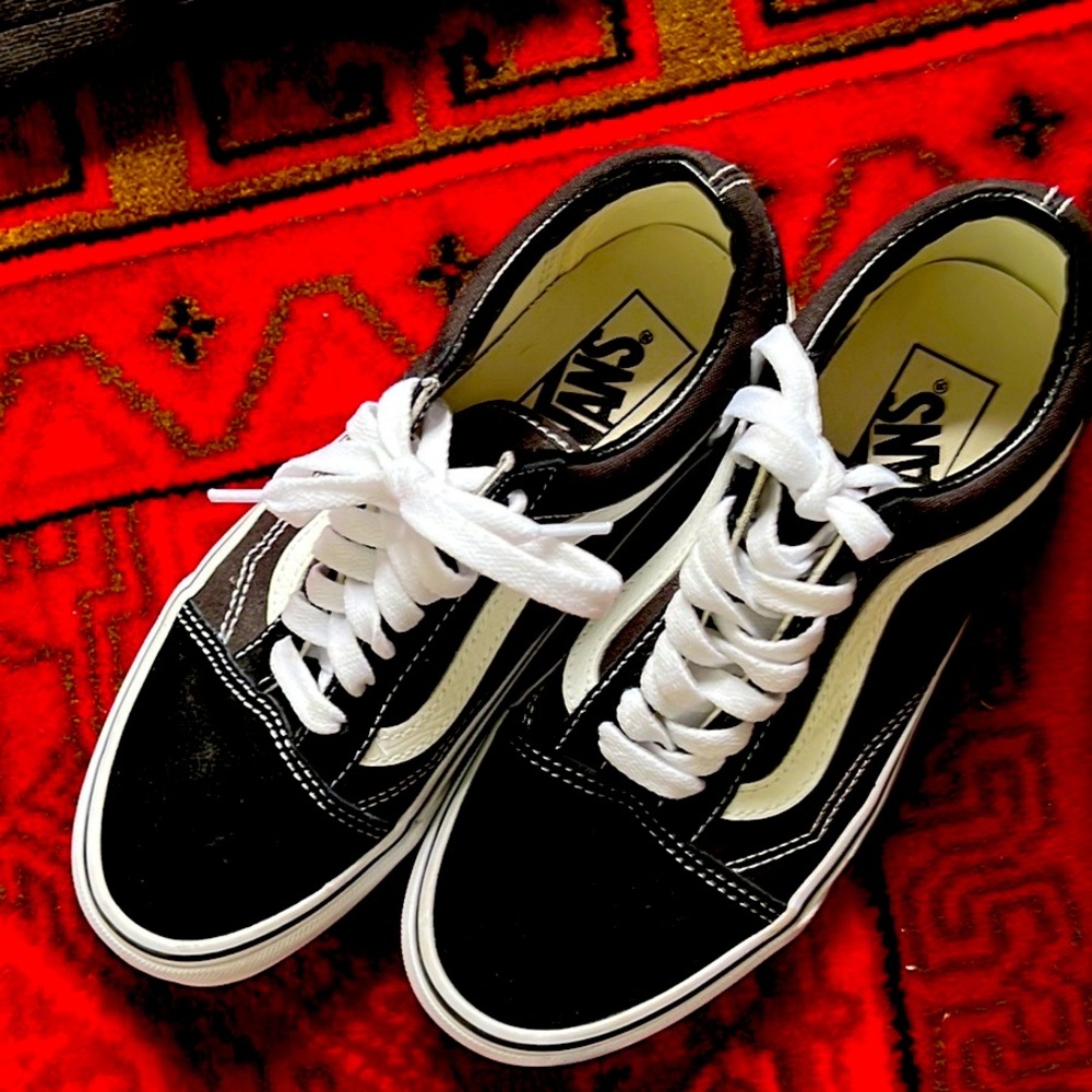 Black suede Vans. Only worn one. Like new…Only worn for a few hours.